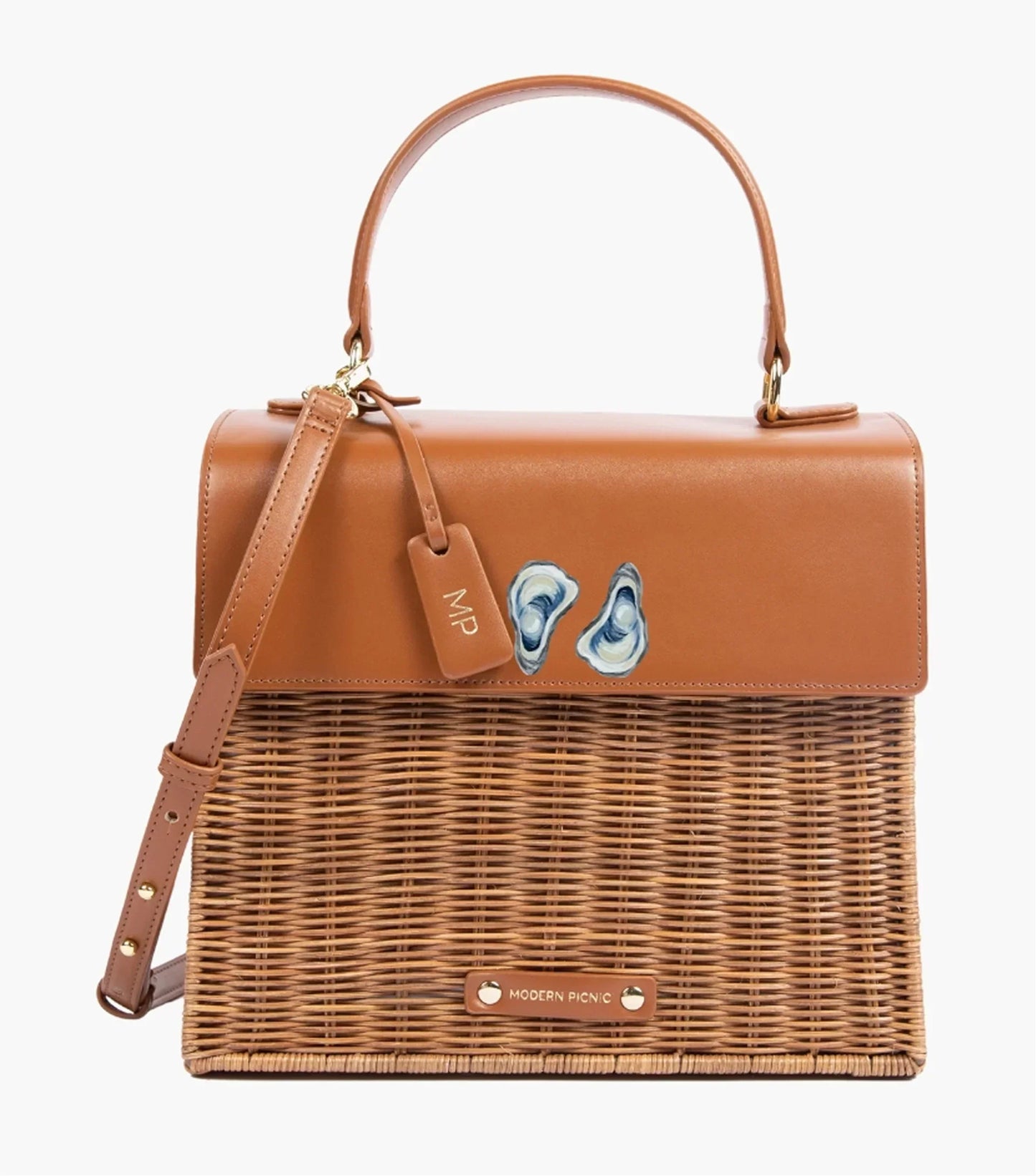 Tan vegan leather and wicker picnic tote with oyster print, top handle, and shoulder strap for work or travel