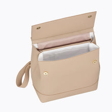 Open view of cream Modern Picnic backpack displaying insulated interior and magnetic flap.