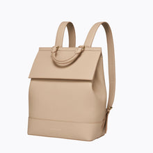Side angle of cream Modern Picnic backpack showing structured vegan leather design